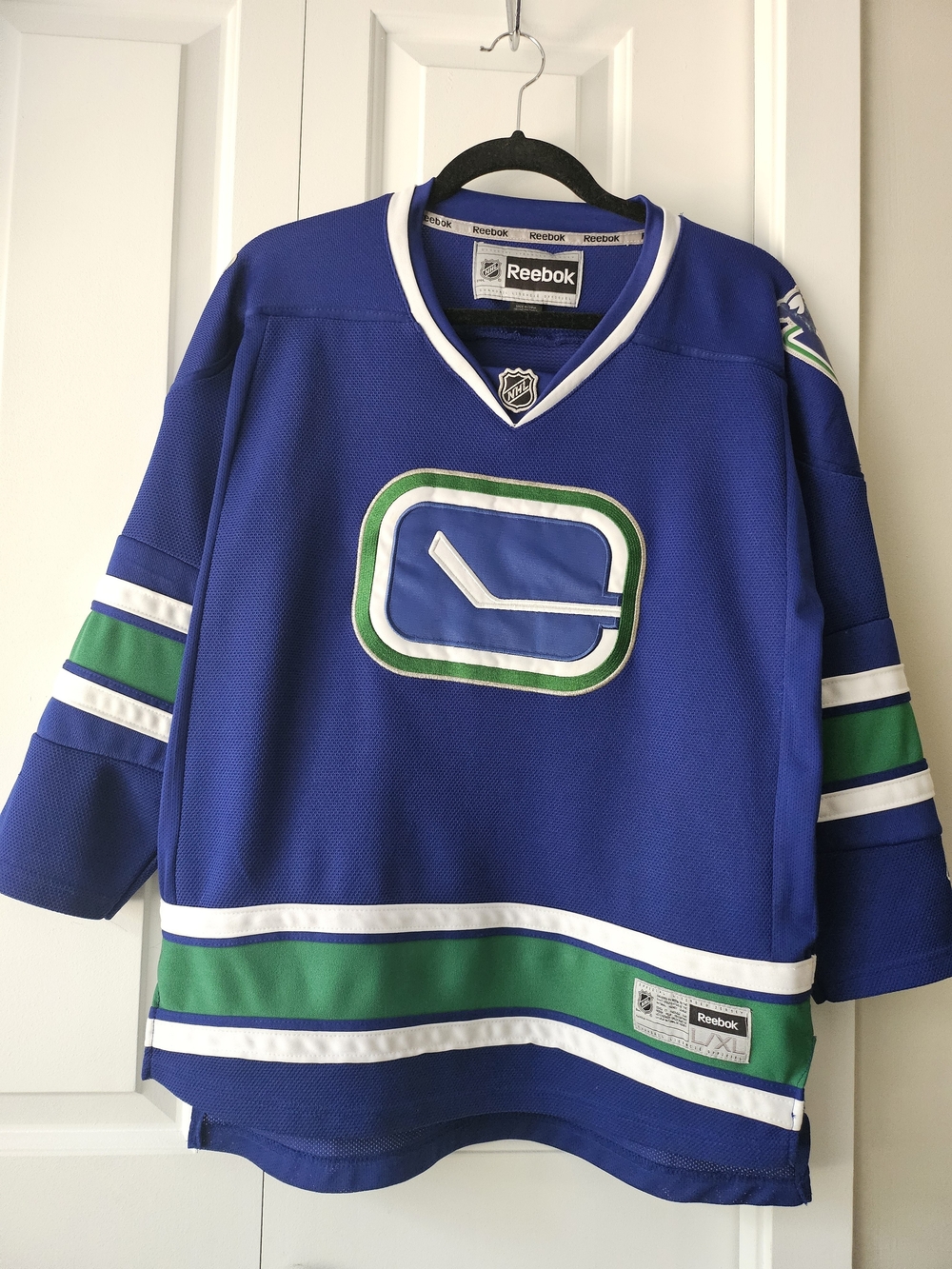 Reebok Kids Blue Canucks Hockey Jersey with Green & White Accents